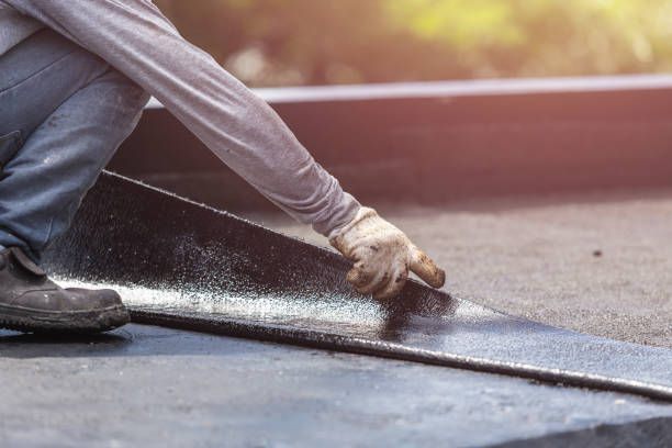 Professional Waterproofing technician working in Harrison, MI